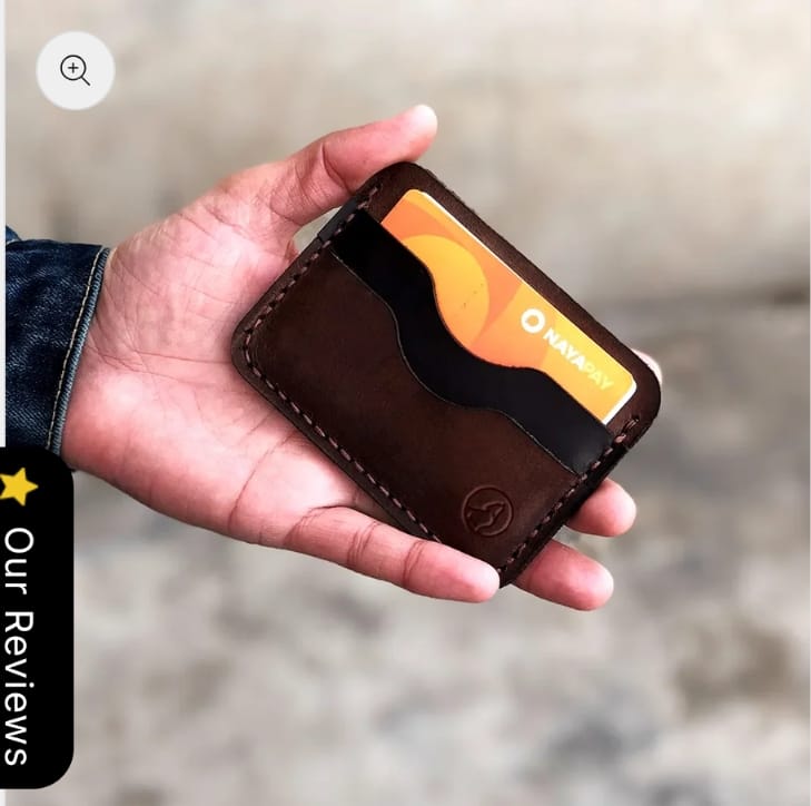 The Maverick Card Sleeve held in hand with a card inside